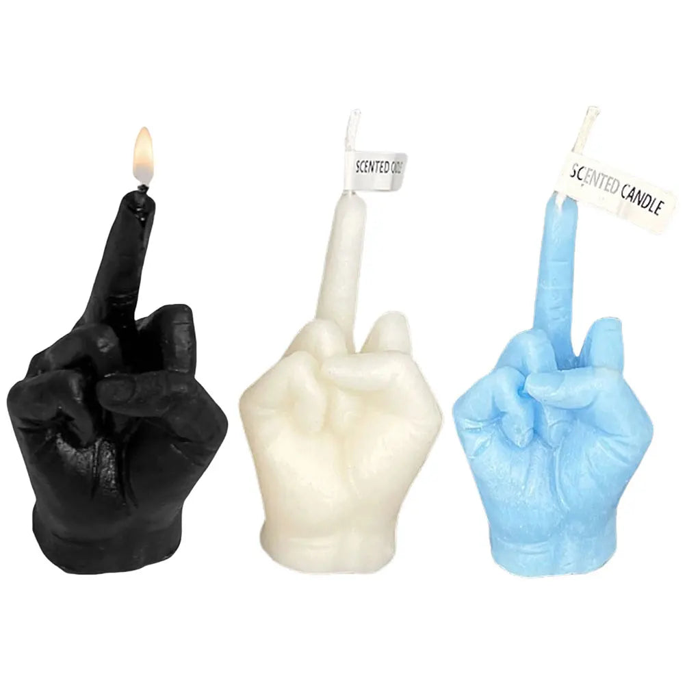 Three hand-shaped scented candles in black, white, and light blue, each gesturing with a raised middle finger.