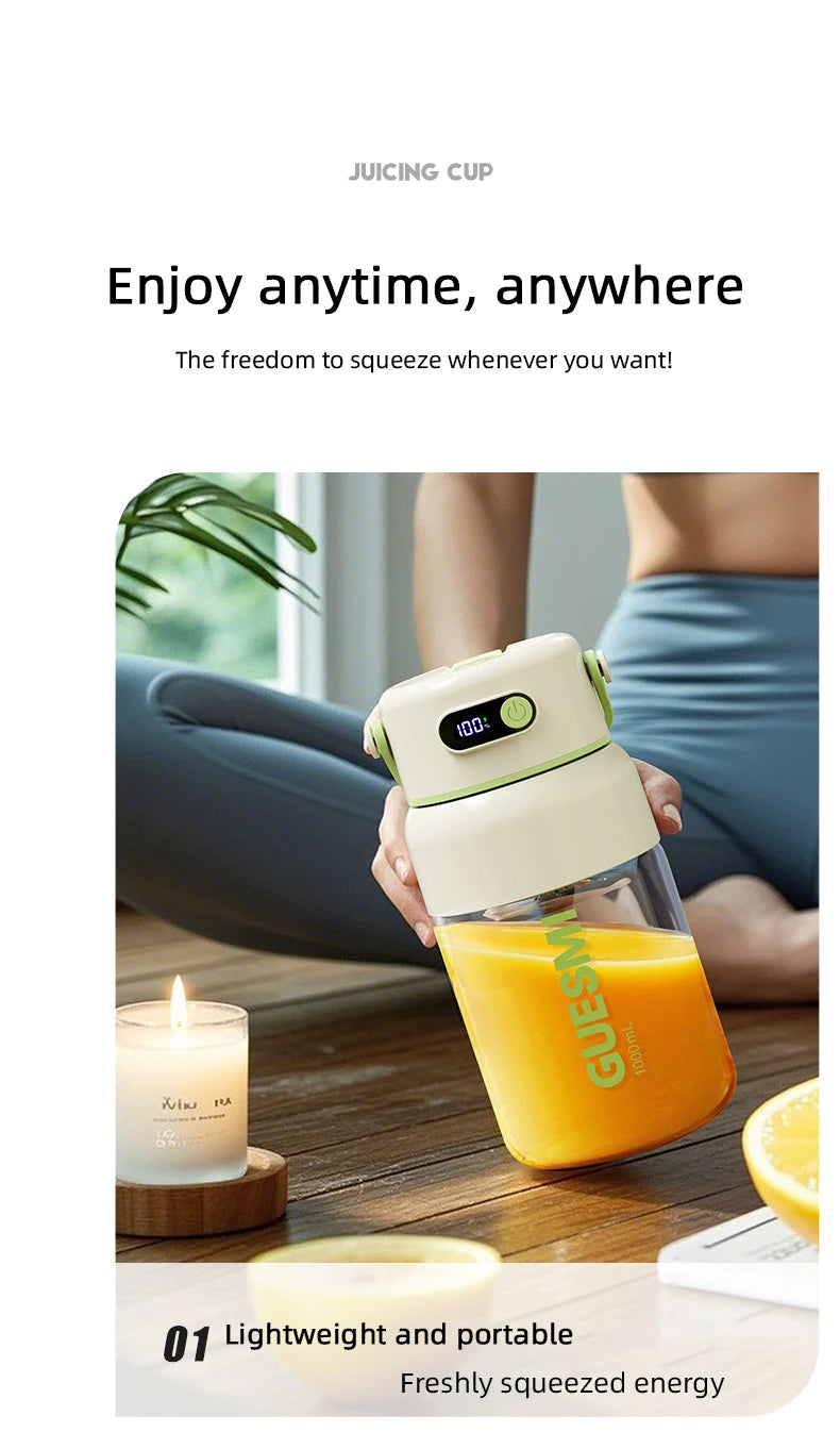 Portable, cream-coloured electric juicing cup with digital display, shown filled with orange juice.