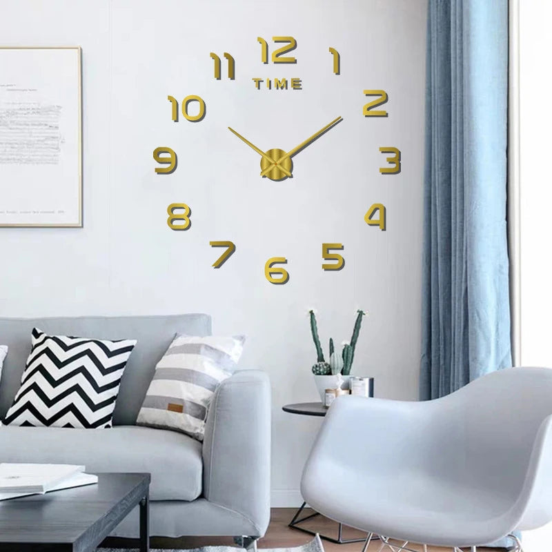 Large, frameless gold acrylic wall clock with 3D numbers and central clock hands, displayed in a modern living room.