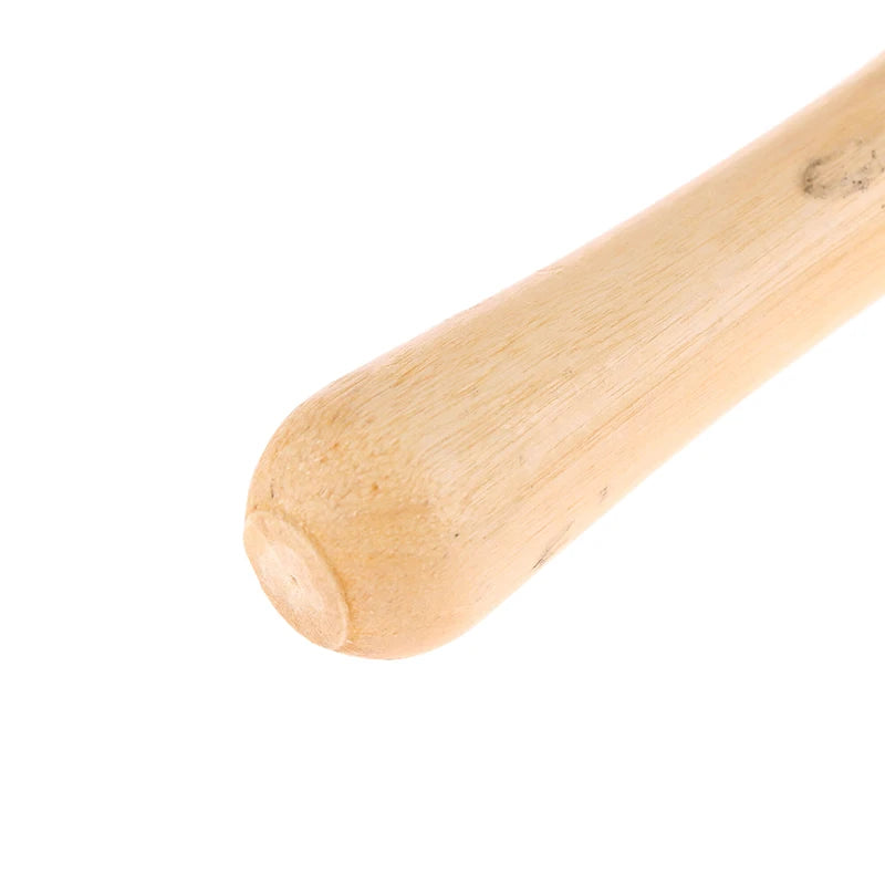 Close-up of a smooth, light-coloured natural wooden handle with a rounded end.