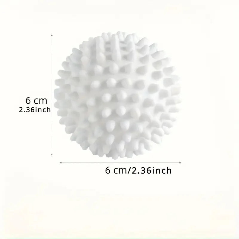 A white 6cm spiky laundry or massage ball shown with size dimension indicators.
