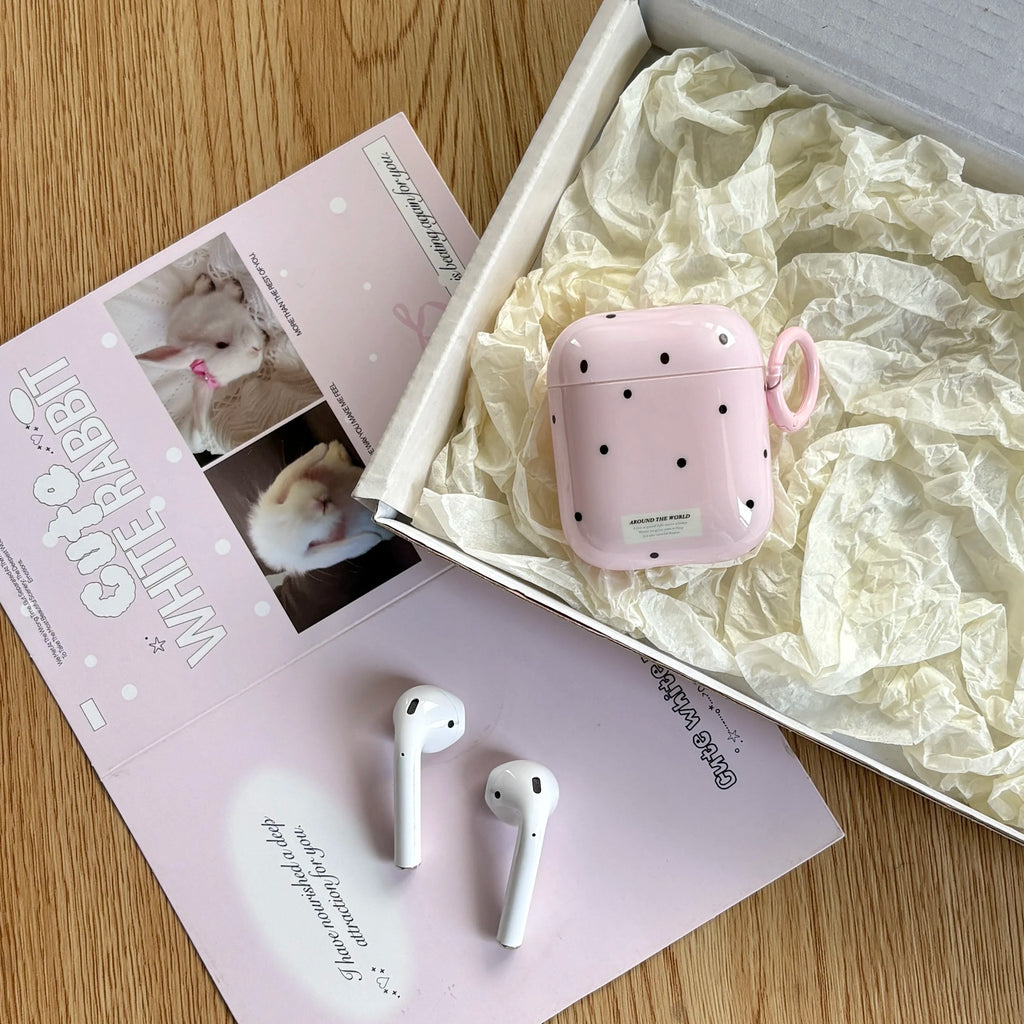 Polka-dot pink plastic case for AirPods (Gen 1/2) in a gift box with matching rabbit-themed packaging.