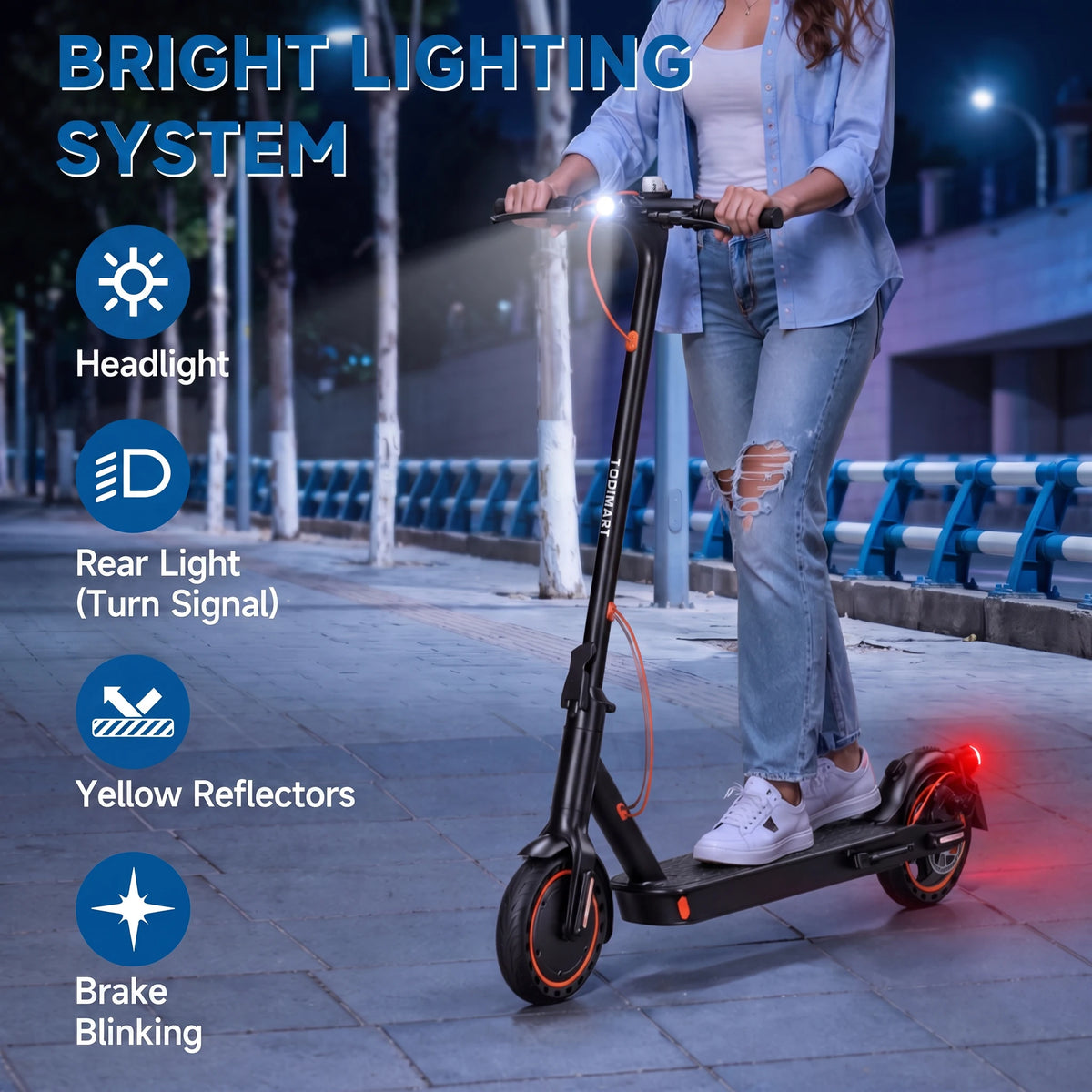 Black TODIMART electric scooter with lit headlight, rear light, and orange accents, ridden by woman at night.