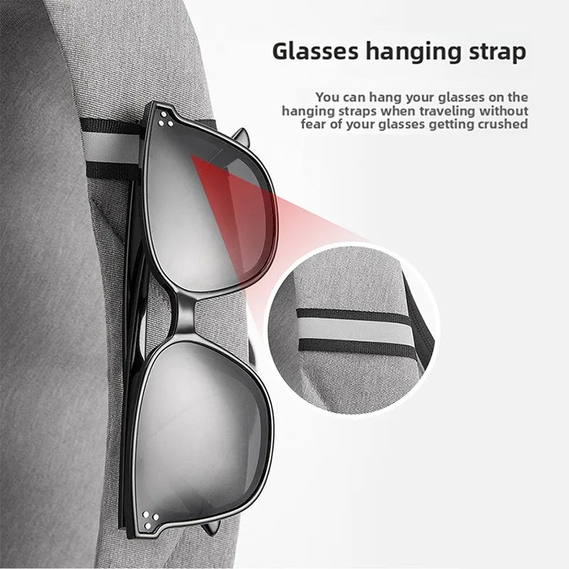 Close-up of a grey anti-theft crossbody bag strap featuring a convenient loop for securely hanging sunglasses.