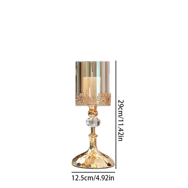 Gold crystal candlestick with a clear glass cylinder, filigree trim, and faceted bead stem.