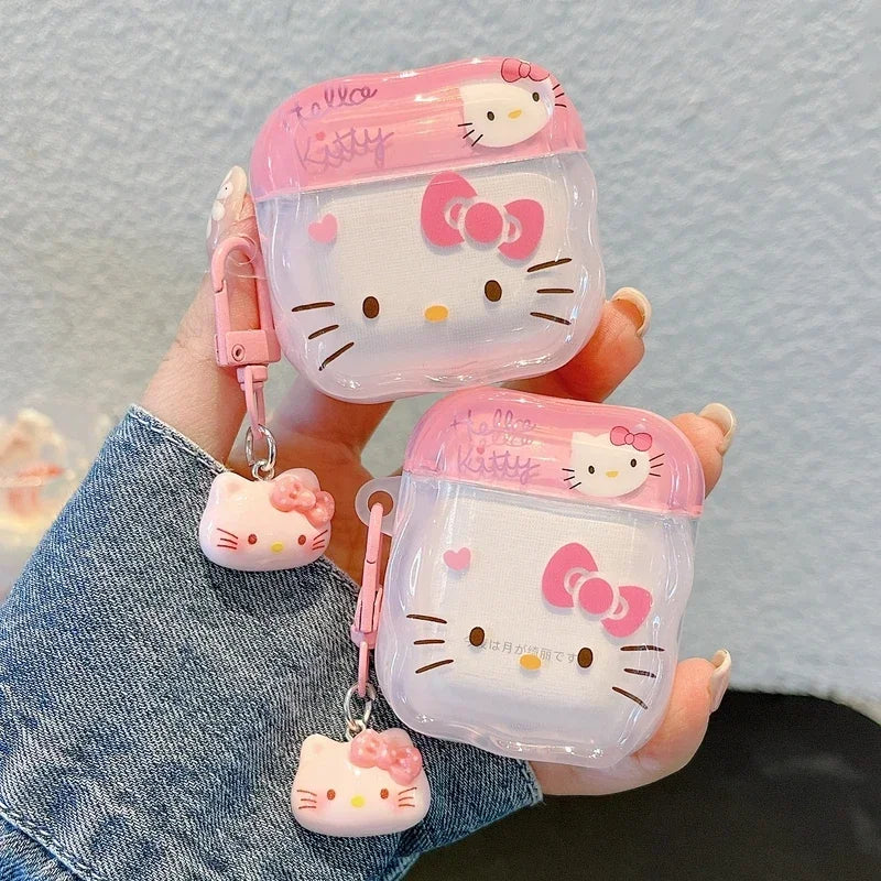 Clear pink Hello Kitty AirPods case with charm, featuring a cartoon design. Suitable for standard AirPods models.