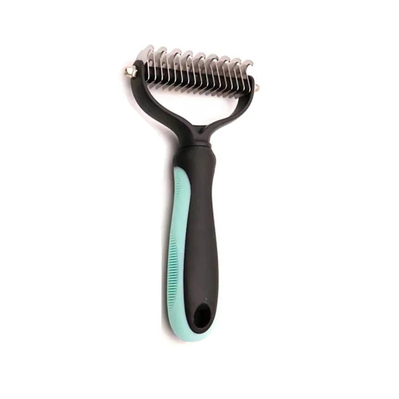 Pet grooming de-matting rake with metal teeth, black and mint green ergonomic handle, white background.