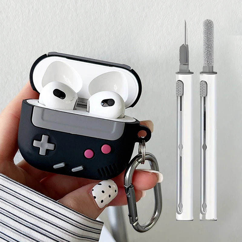 Black silicone retro games console AirPods 3 case with carabiner and matching cleaning tool.