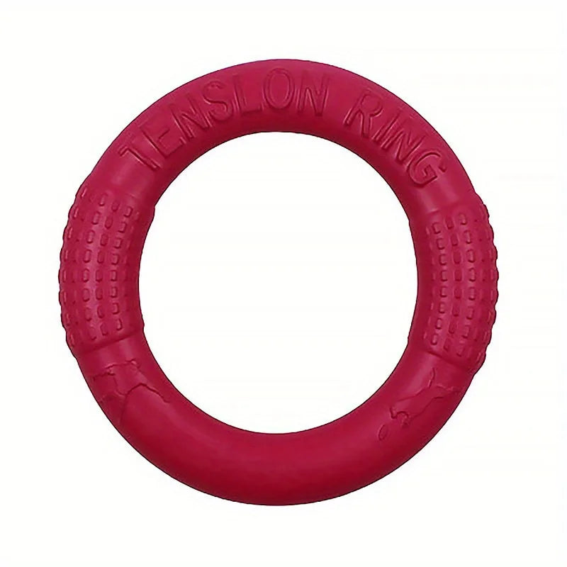 A bright pink, durable EVA foam ring toy for dogs with a textured grip and embossed dog silhouettes.