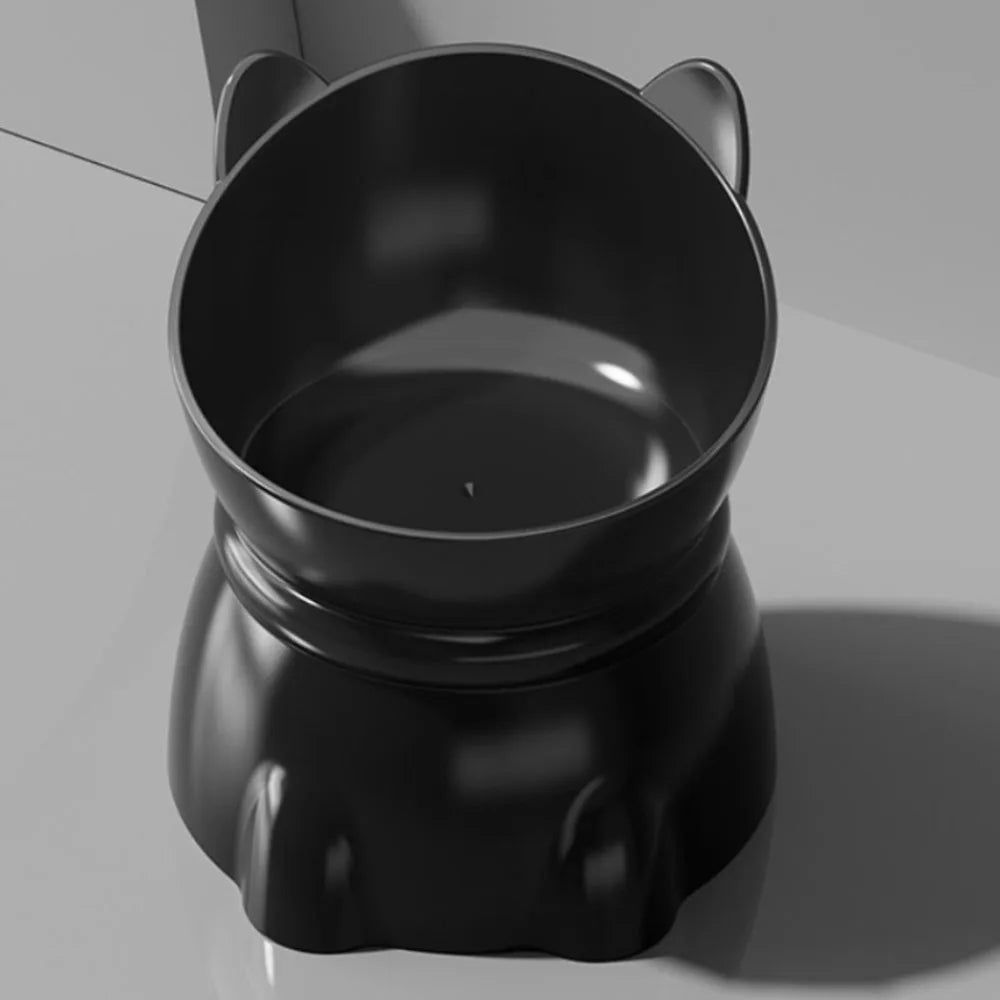 An elevated, matte black pet bowl shaped like a cat’s head with cute ears, designed for comfortable feeding.