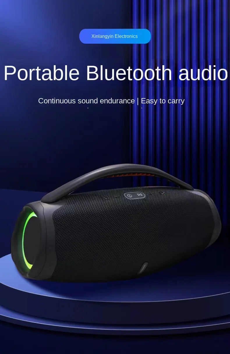 Black portable 100W Bluetooth speaker with a sturdy carry handle and glowing green RGB side lighting.