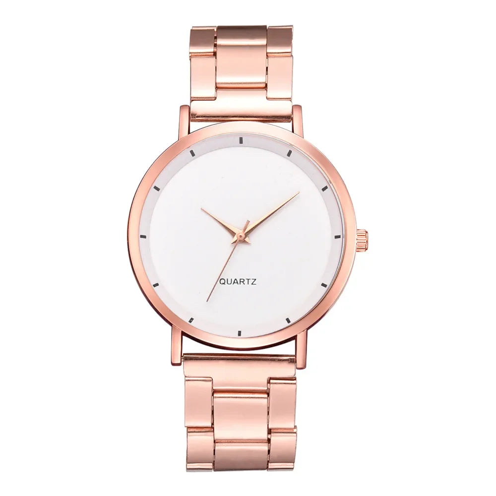 Ladies' minimalist rose gold stainless steel watch with a clean white round dial and matching metal link strap.