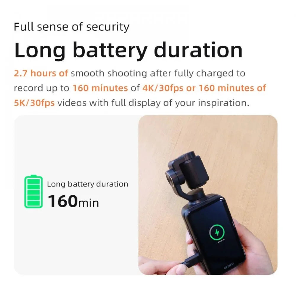 Black plastic gimbal camera being charged with a USB cable, featuring a screen with a battery charging icon.