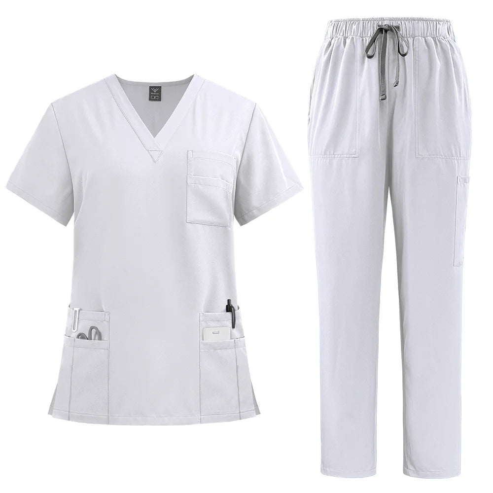 Women’s white scrub set with a V-neck top, multiple pockets, and trousers featuring an elasticated drawstring waist.