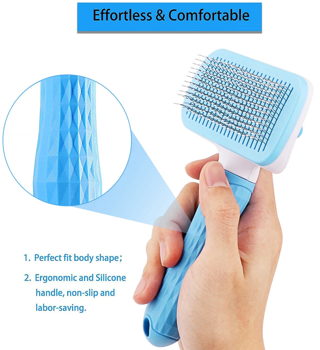 Light blue pet slicker brush with a textured, ergonomic handle being held by a hand.