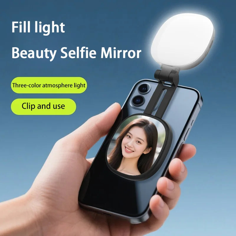 Black clip-on smartphone selfie mirror with an adjustable three-colour LED fill light for better lighting.