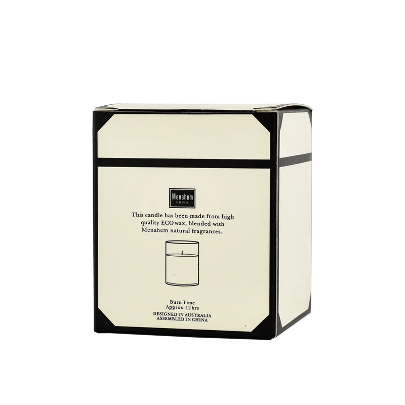 Cream-coloured square candle box with black trim, featuring eco wax details and a 12-hour burn time.