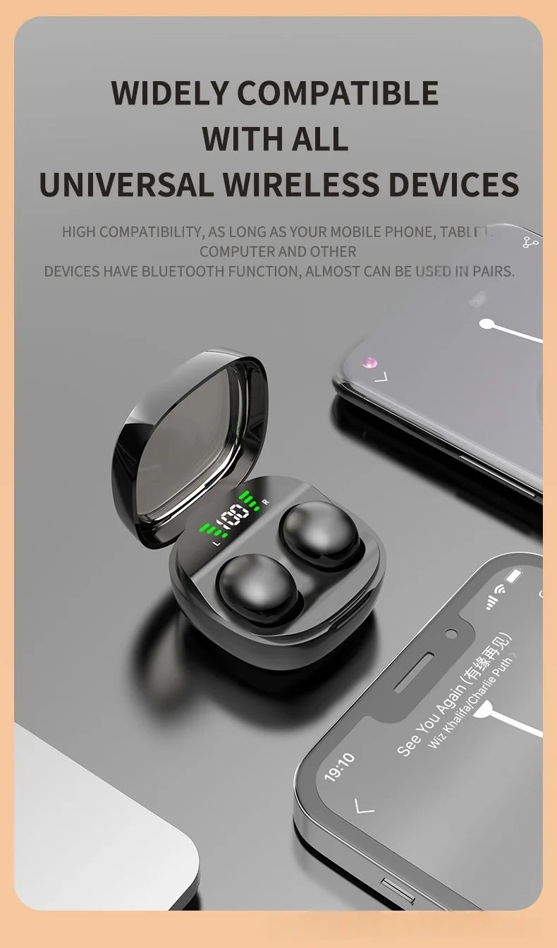 Black wireless earbuds in an open charging case with a digital battery display, next to a smartphone.
