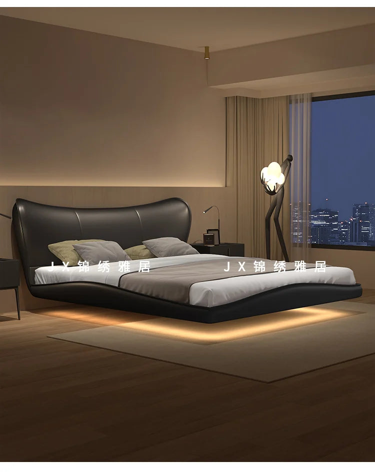Modern black upholstered floating bed frame with a curved headboard and warm under-bed LED lighting.