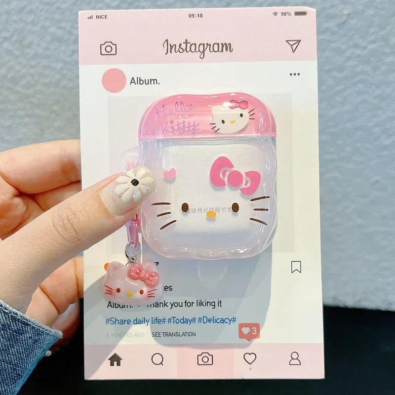 Clear Hello Kitty silicone AirPods case with pink lid, 3D bow, and charm, on Instagram-themed backing card.