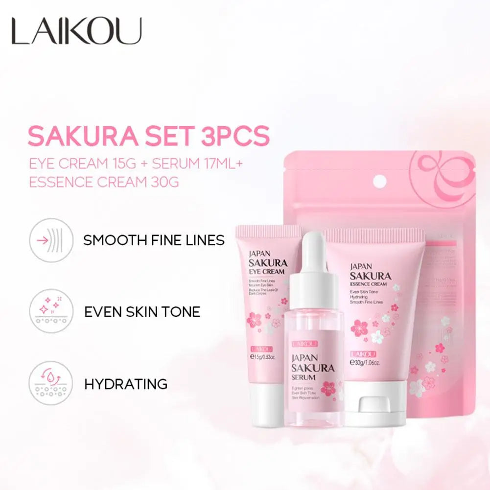 Three-piece sakura skincare set featuring eye cream, serum, and essence cream in pink packaging for hydration.