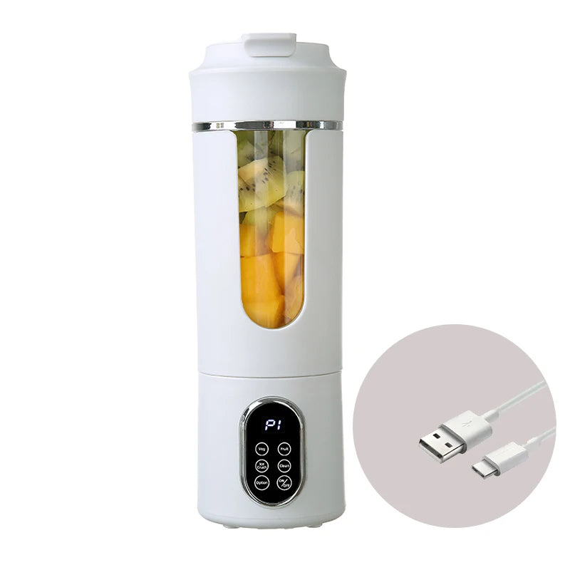 White portable blender with a fruit-filled clear middle section, digital display, control buttons, and charging cable.