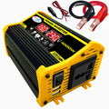 Portable black and yellow car power inverter with digital display, AC outlet, USB ports, and battery cable accessories.