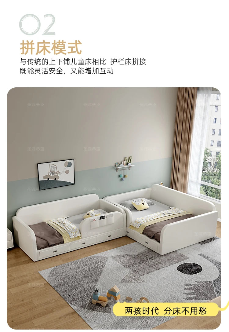 Two white modern upholstered single storage beds with protective side rails arranged side-by-side in a children's room.