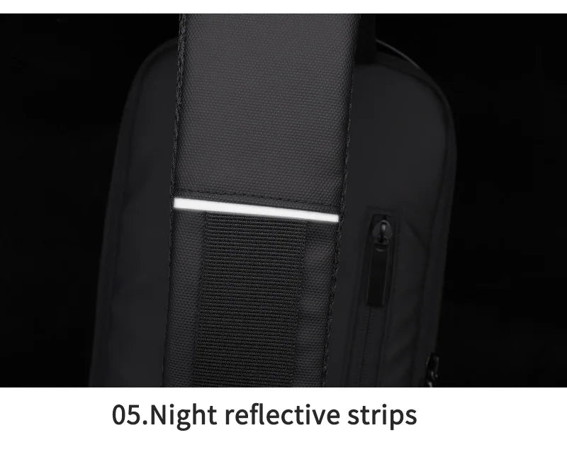 Close-up of a black waterproof sling bag strap featuring a horizontal night-reflective safety strip.