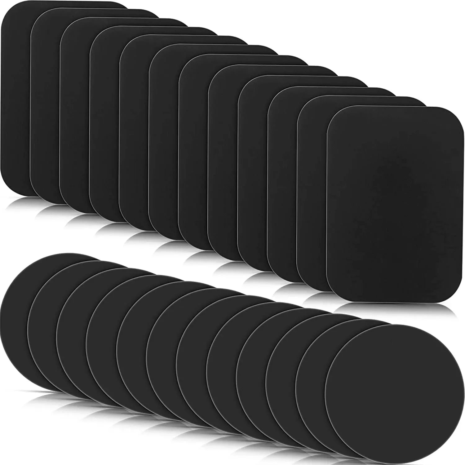 A stack of black magnetic plates featuring both rectangular and circular shapes with smooth, rounded corners.