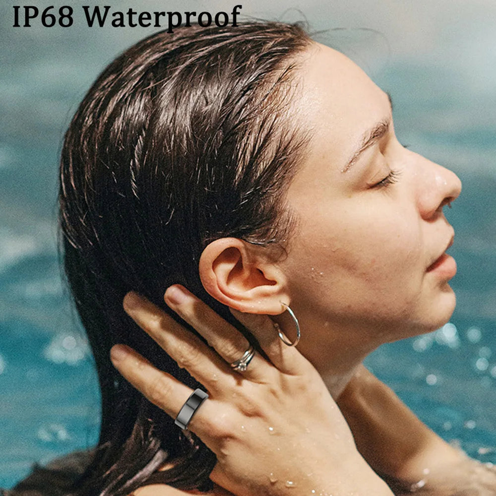A woman wearing a sleek, metallic grey waterproof smart fitness ring whilst swimming in a pool.