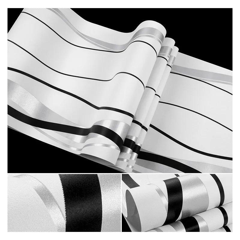 Modern wallpaper featuring elegant curved black and metallic silver stripes on a crisp white background.