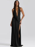 Black sleeveless maxi dress with a deep V-neck halter, draped bodice, and a high thigh slit.
