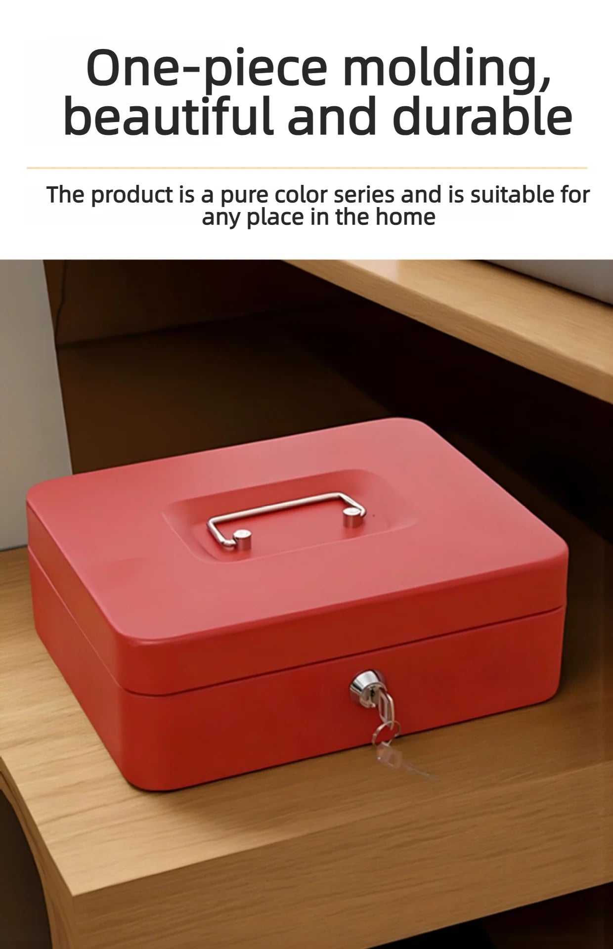 Red metal cash box with a retractable top handle and a keyed front lock, sitting on a wooden surface.