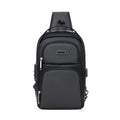 Black waterproof travel sling bag with zip compartments, integrated password lock, and external charging port.