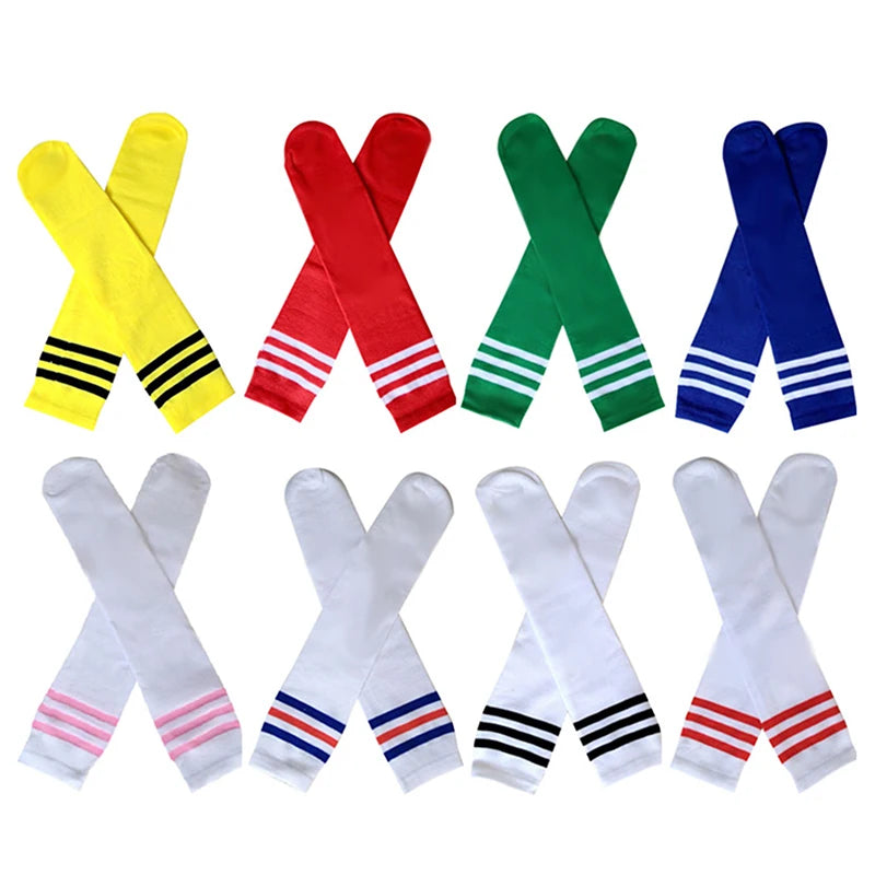 Eight pairs of knee-high socks in various vibrant colours and white, each featuring three striped bands at the cuff.