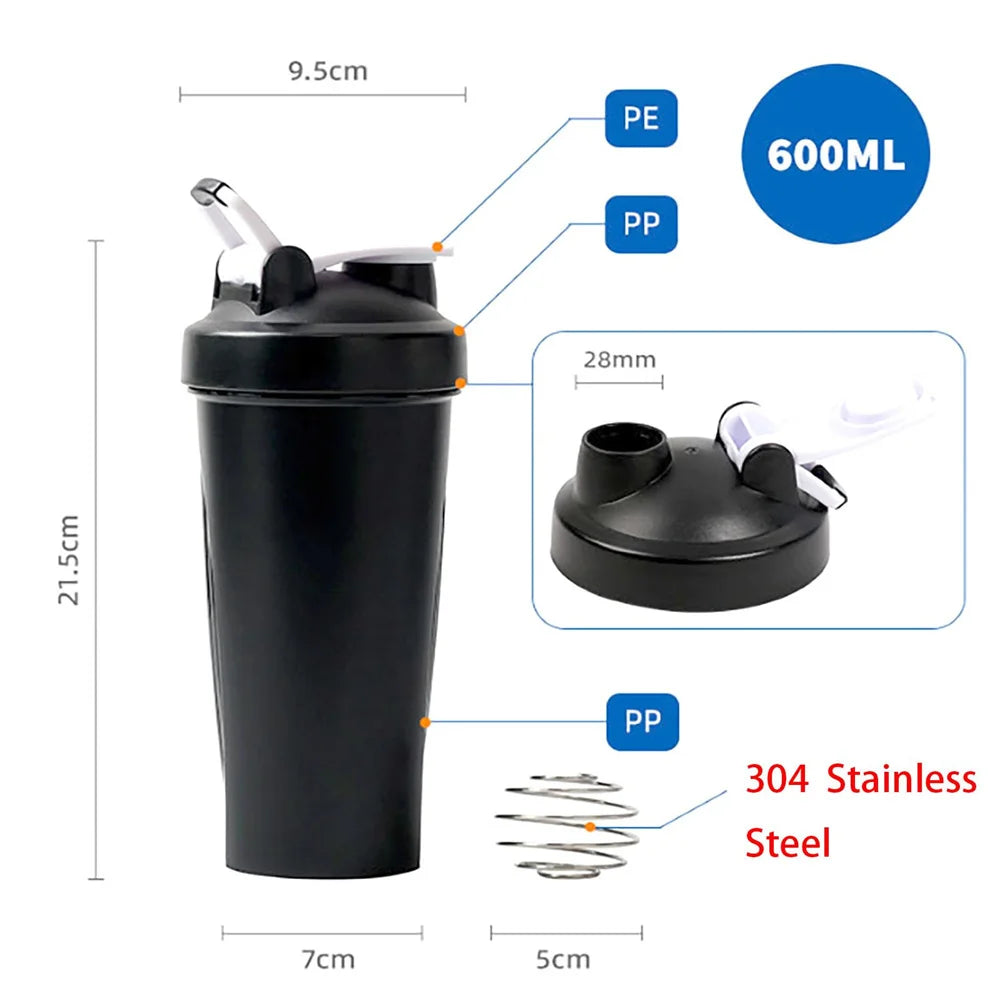 Black 600ml protein shaker bottle with a lid, flip cap, and stainless steel mixing ball, showing dimensions.
