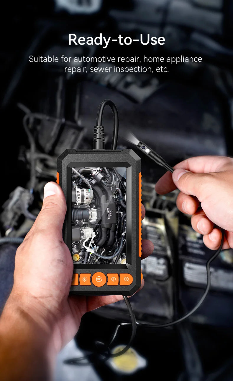 Black and orange industrial handheld borescope displaying an engine inspection on its HD screen.