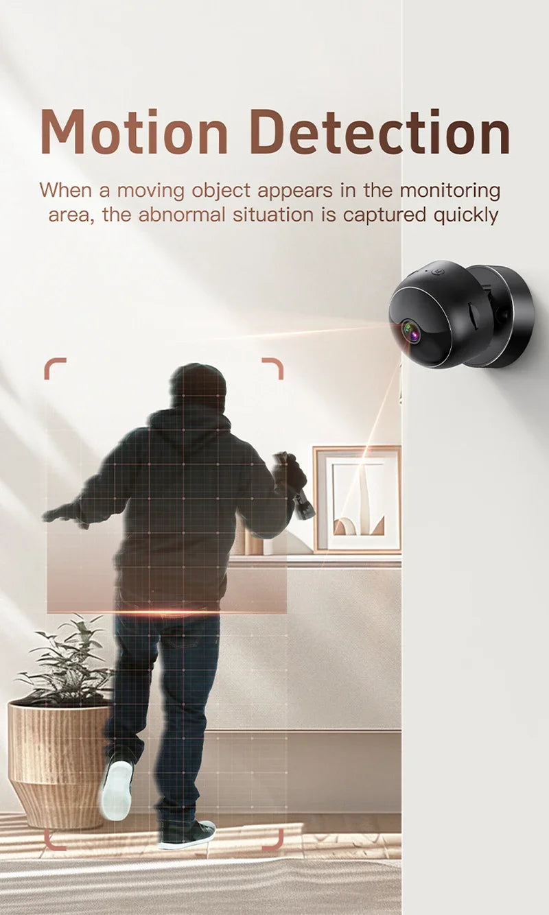 Black spherical wireless security camera mounted on a wall, capturing motion with digital tracking grid overlay.