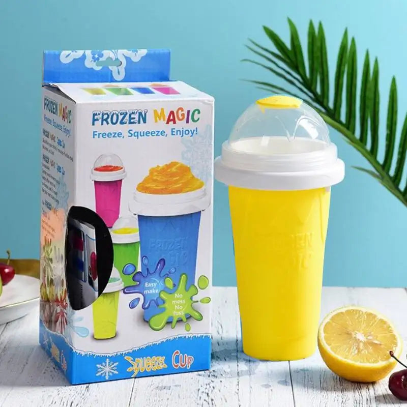 Bright yellow, squeezable slushy maker cup with a white lid and clear dome cap, shown next to its product box.