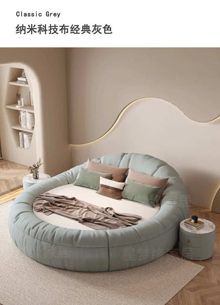 Modern, circular grey fabric bed frame with a soft, tufted minimalist design. 200x200cm size for a stylish bedroom.