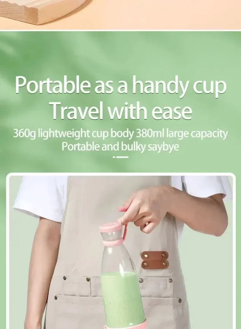 Portable clear bottle with pink lid and base, holding a green drink, held by a person in an apron.