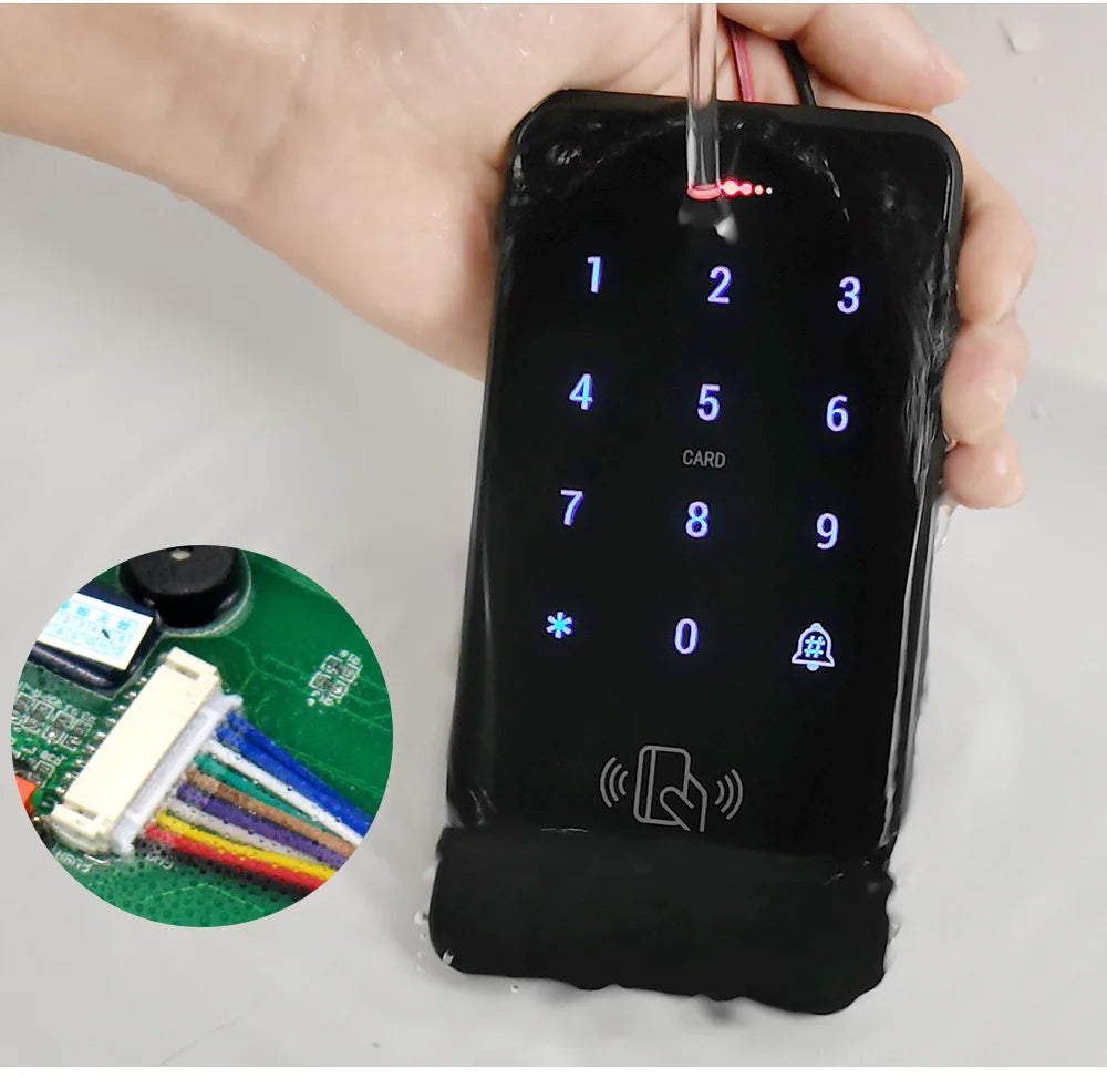 Waterproof black plastic digital keypad with touch-sensitive numbers, card reader, and an inset of internal wiring.
