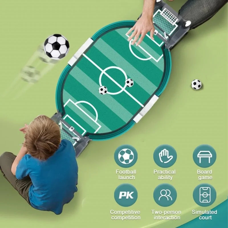 Oval tabletop football game with a green pitch, two goals, and miniature soccer balls for two-player competitive play.