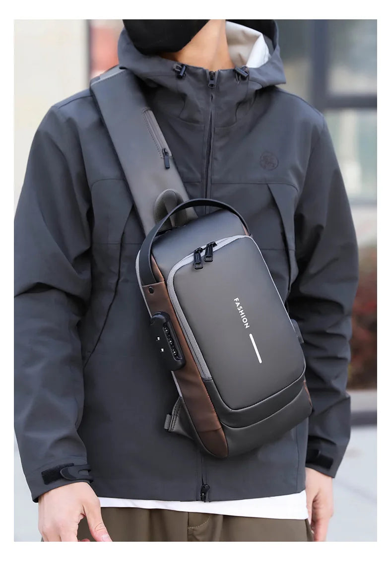 A sleek, grey and brown anti-theft chest bag with a combination lock, USB charging port, and adjustable strap.