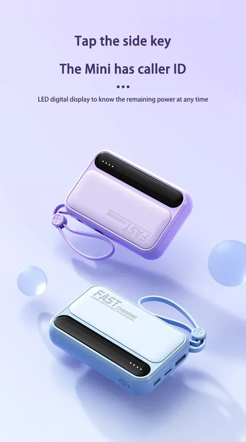 Two compact, portable power banks in purple and blue, featuring built-in carry straps and LED digital display screens.