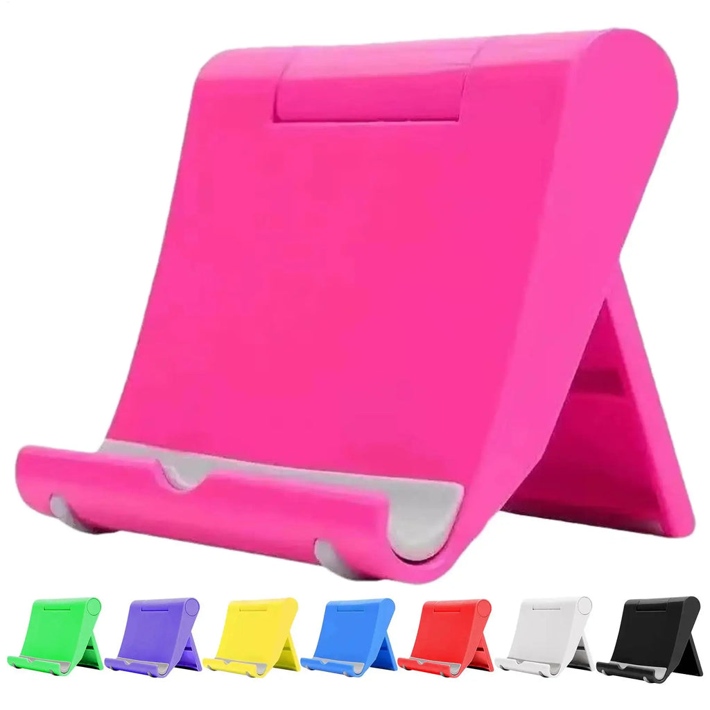 Foldable, adjustable pink plastic phone stand with a white non-slip base. Also available in various other colours.