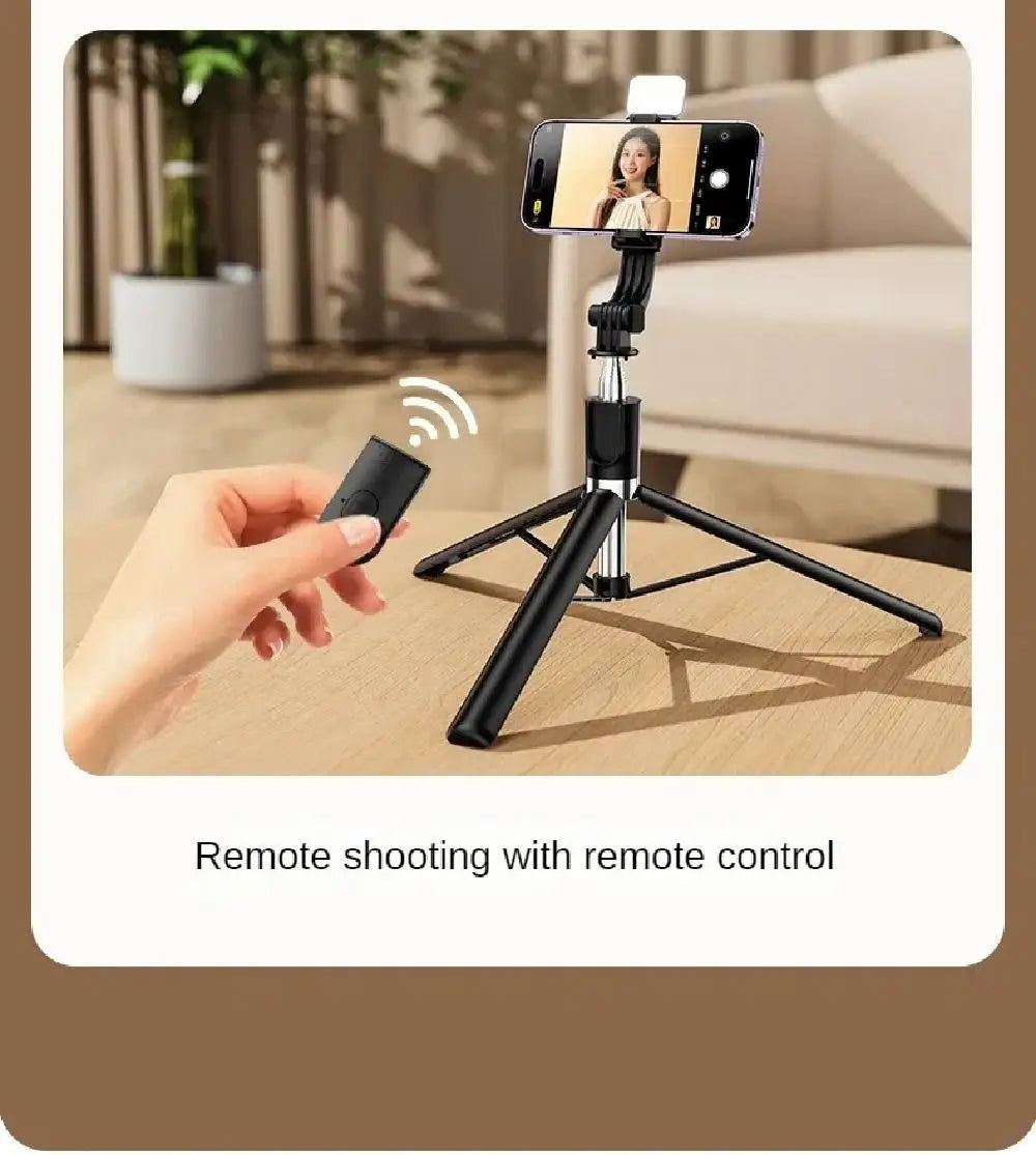 Black extendable phone tripod stand with a wireless remote control for hands-free photography.