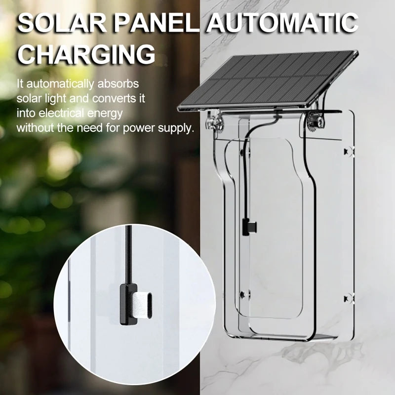 Clear, wall-mounted smart video doorbell housing with an integrated black solar panel for automatic charging.
