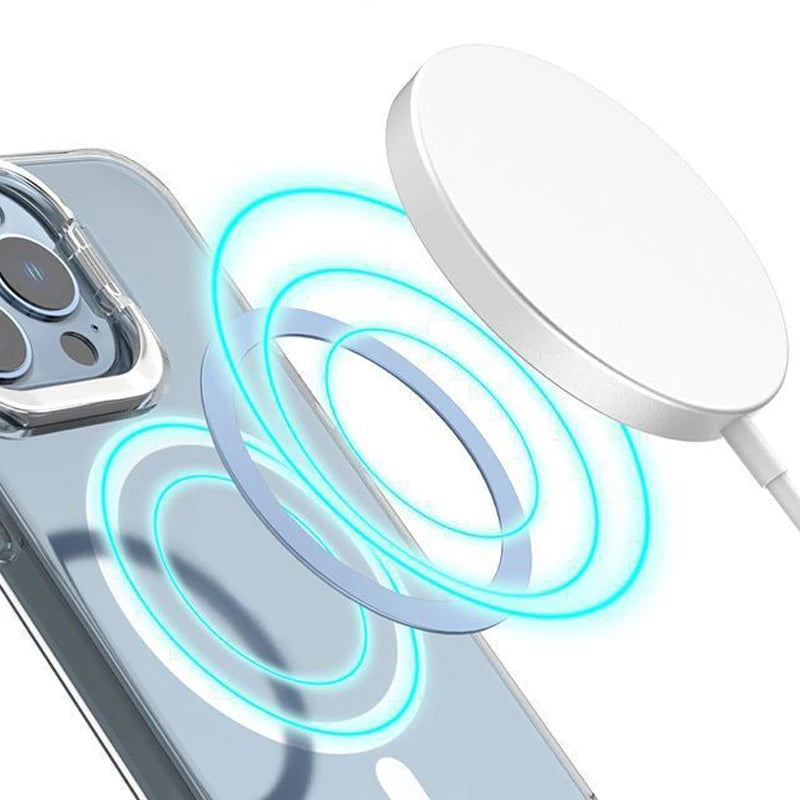White magnetic wireless charger hovering over a clear smartphone case with a blue glowing ring effect.